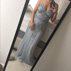 Floor length beaded gown.